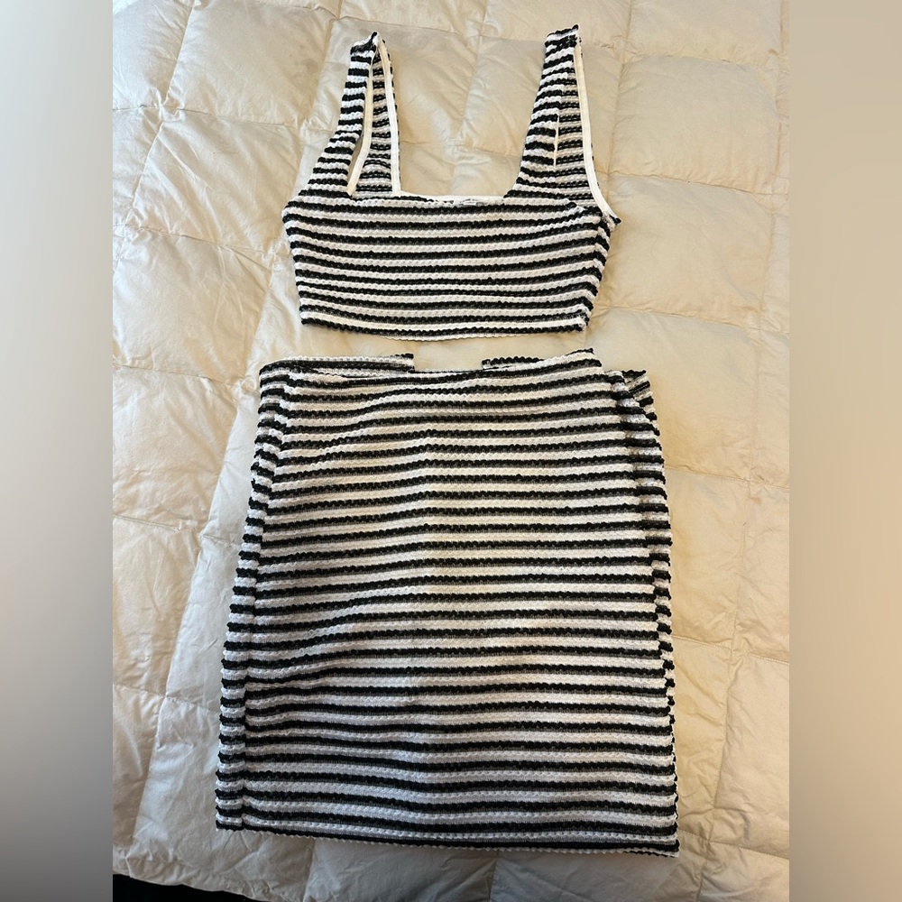 Brand new never worn skirt and tank two piece